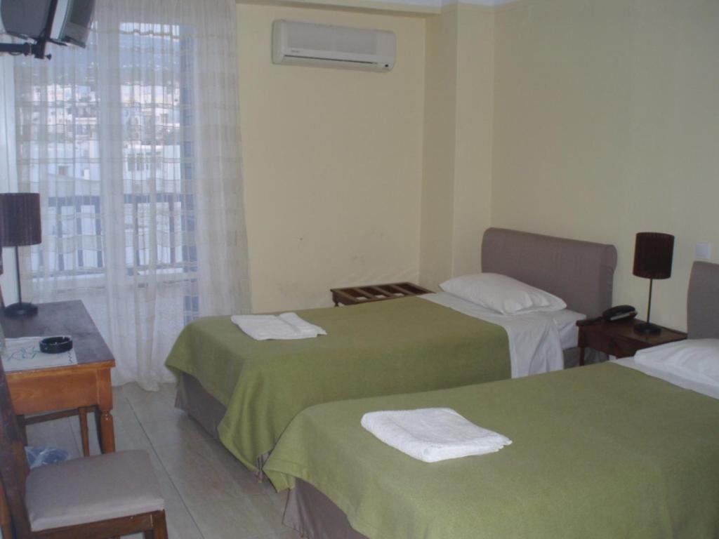 Delfinia Hotell Tínos Rum bild
