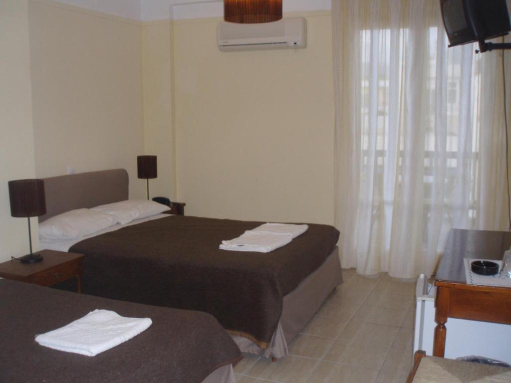 Delfinia Hotell Tínos Rum bild