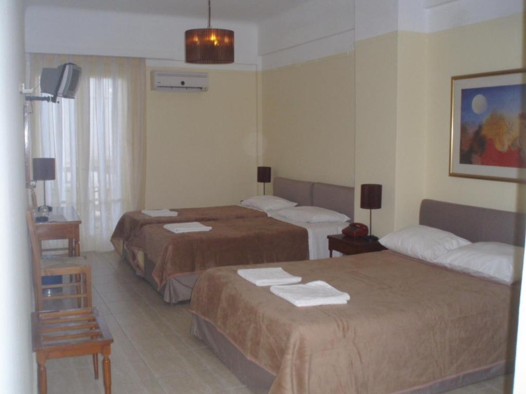 Delfinia Hotell Tínos Rum bild