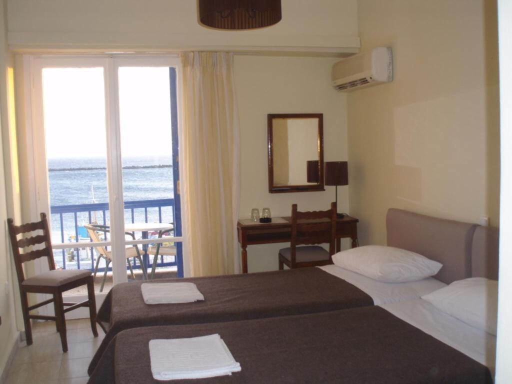 Delfinia Hotell Tínos Rum bild