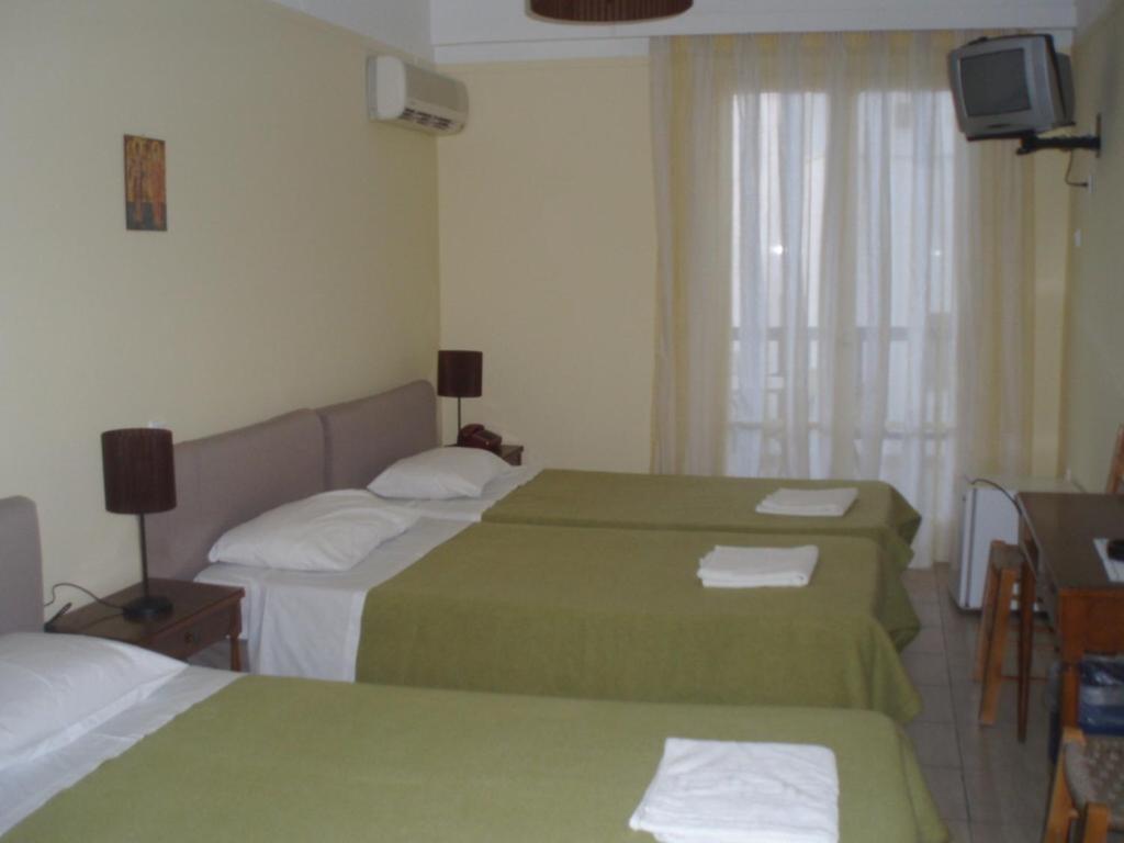 Delfinia Hotell Tínos Rum bild